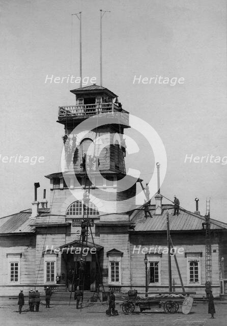 Irkutsk police fire brigade. Exercise with ladders and hooks, 1894. Creator: R Prorokov.