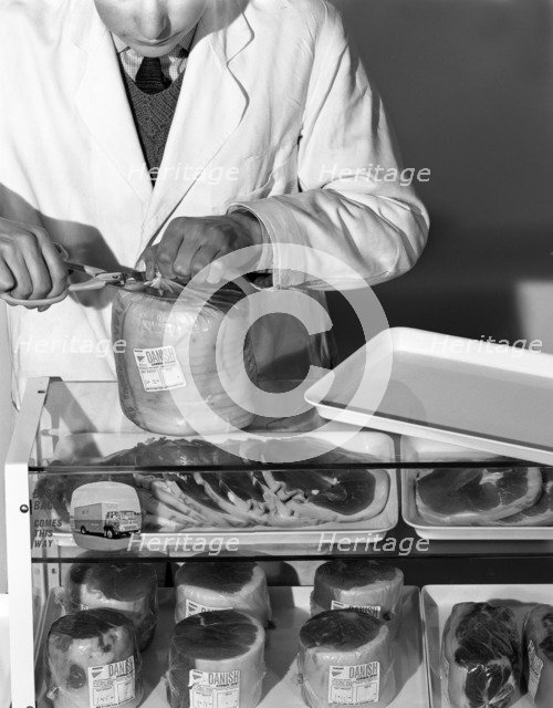 Pre-packed gammon steaks, Danish Bacon Company, Yorkshire, 1964. Artist: Michael Walters