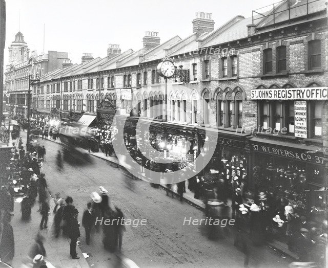 Busy street scene, St John's Road, Clapham Junction, London, 1912. Artist: Unknown.