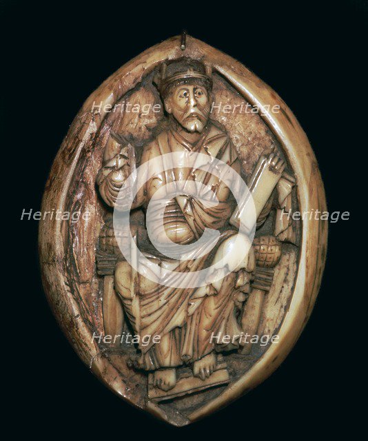 Anglo-Saxon carving of a man writing a book, 10th century. Artist: Unknown