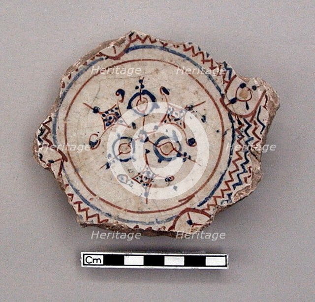 Fragmentary base of a bowl with image of a rider, early 13th century. Creator: Unknown.