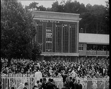 Totaliser/Tote Board at a Crowded Horse Racing Track, 1931. Creator: British Pathe Ltd.