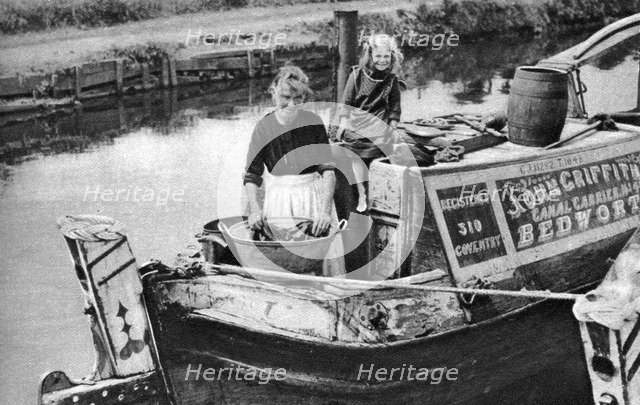 Washing day on the canal boat, 1926-1927. Artist: Unknown