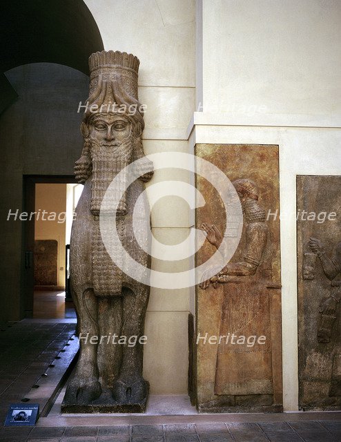Assyrian sculpture of a human-headed winged bull at the palace gateway, Khorsabad, 8th century BC. Artist: Unknown