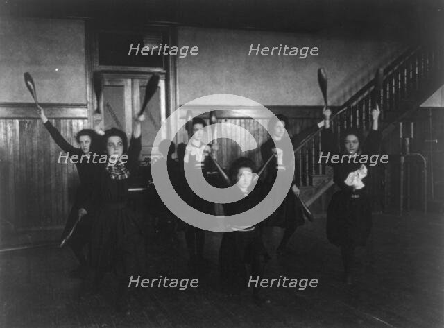 Female students exercising with bowling pins, Western High School, Washington, D.C., (1899?). Creator: Frances Benjamin Johnston.