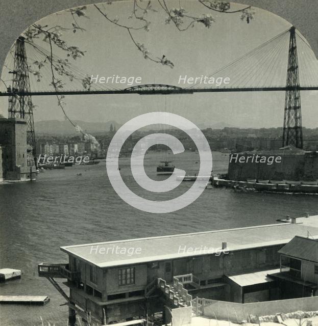 'The Transporter Bridge and Entrance to Old Harbor, Marseilles, France', c1930s. Creator: Unknown.