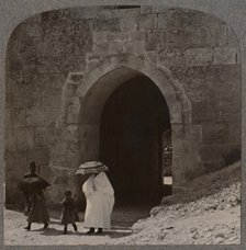 'Mahommedan women entering Jerusalem by Herod's Gate', c1900. Artist: Unknown.