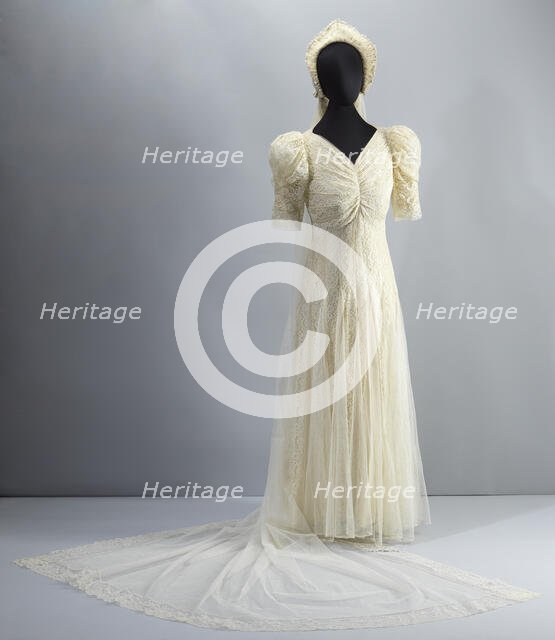 Wedding dress worn by Lollaretta Pemberton with veil and headpiece, 1939. Creator: Unknown.