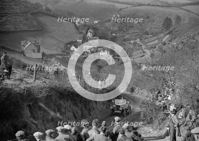 Riley Tourer competing in the MCC Lands End Trial, Beggars Roost, Devon, 1928 or 1929. Artist: Bill Brunell.