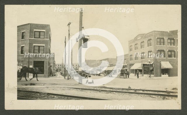Photograph album page with three photographs, before 1921. Creator: Unknown.