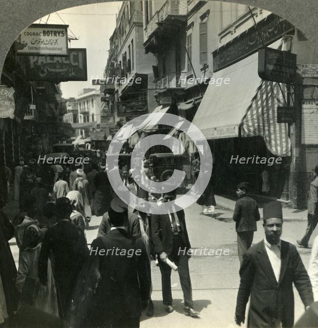 'West on the Muski, Chief Arabian Thoroughfare of Cairo, Egypt', c1930s. Creator: Unknown.