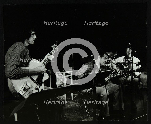 Guitarists John Etheridge and Ike Isaacs performing at The Stables, Wavendon, Buckinghamshire. Artist: Denis Williams