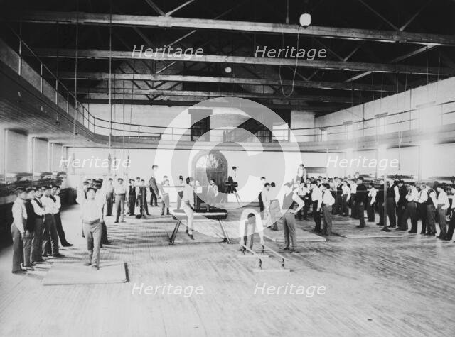 Male Native American students in physical education class, Carlisle..., Pennsylvania, c1901 - 1903. Creator: Frances Benjamin Johnston.