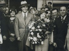 Max Schmeling and Anny Ondra arrive in Barcelona, Spain, 1933. Artist: Unknown