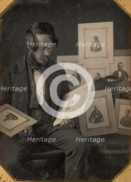 Frederick Langenheim Looking at Talbotypes, ca. 1849-51. Creators: William Langenheim, Frederick Langenheim.