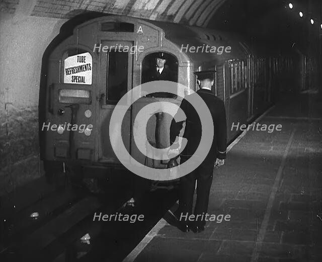 A Tube Train Stopping, 1940. Creator: British Pathe Ltd.