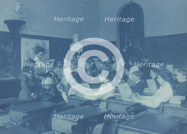A lesson in globe making. Children in class in a Washington, D.C., school, 1899. Creator: Frances Benjamin Johnston.