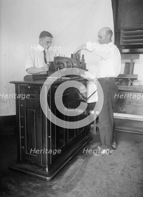 Census Bureau, Department of Commerce - Tabulating Machine, 1917. Creator: Harris & Ewing.