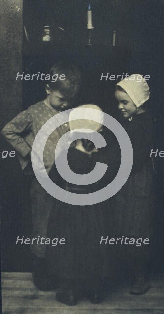 We're going to have warm potatoes!, c1900. Creator: Elizabeth B. Brownell.