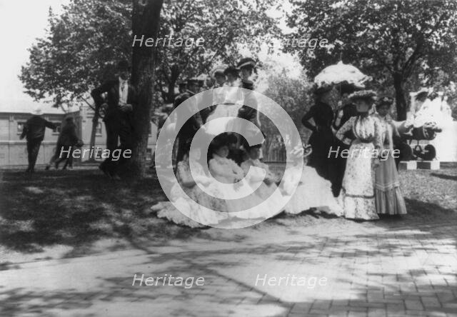 U.S. Naval Academy, Annapolis: cadets and women on lawn, (1902?). Creator: Frances Benjamin Johnston.