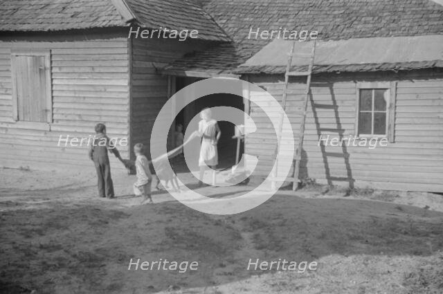 Burroughs children playing in the yard, Hale County, Alabama, 1936. Creator: Walker Evans.