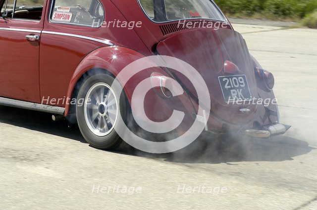 VW Beetle Burning out. Artist: Unknown.