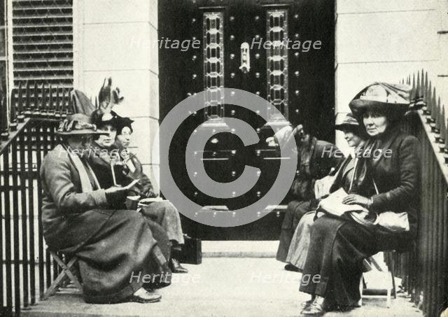 Suffragettes waiting on the doorstep of Sir Edward Carson's London home, 6 April 1914, (1947). Creator: Unknown.