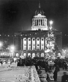 Christmas illuminations in the Market Square, Nottingham, Nottinghamshire, c1950s. Artist: Edgar Lloyd