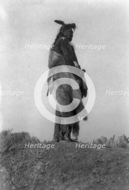 Hoop on the Forehead, c1908. Creator: Edward Sheriff Curtis.