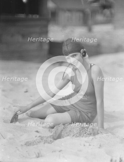 Miss Marguerite Churchill, at the beach, 1923 July. Creator: Arnold Genthe.