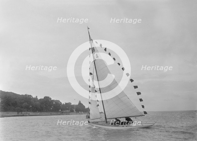 Saling yacht 'Asphodel' (K5) with prize flags, 1922. Creator: Kirk & Sons of Cowes.
