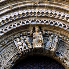 Detail of the main portico of the church of Santa Maria of Agramunt, with typical decoration of t…