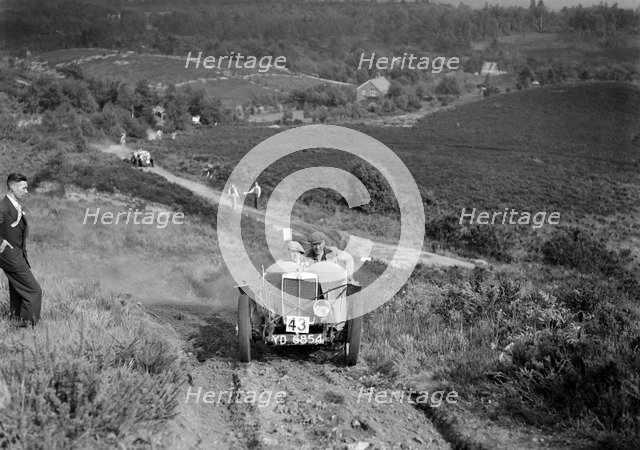 1933 MG J2 taking part in the NWLMC Lawrence Cup Trial, 1937. Artist: Bill Brunell.