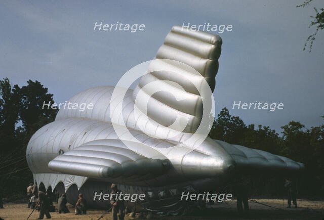 U.S. Marine Corps, bedding down a big barrage balloon, Parris Island, S.C., 1942. Creator: Alfred T Palmer.