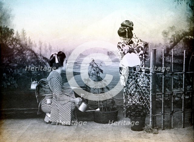 Japanese girls playing in a garden, 1880. Creator: Unknown.