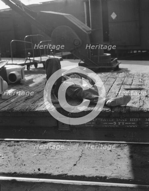 Scene in railroad yard, Sacramento, California, 1936. Creator: Dorothea Lange.