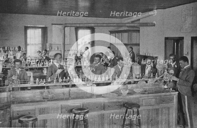 In the agricultural laboratory, 1904. Creator: Frances Benjamin Johnston.