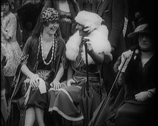 Three Smartly Dressed Female Civilians Sitting on Chairs, 1924. Creator: British Pathe Ltd.