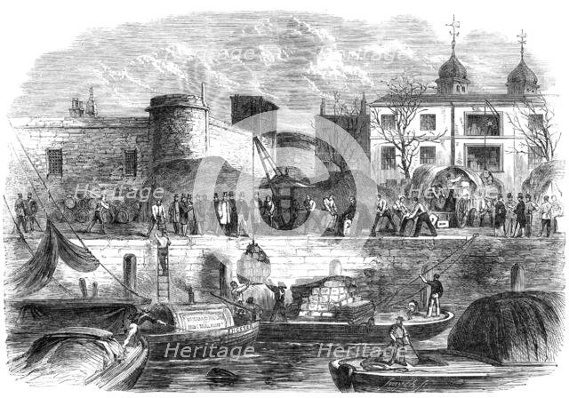 Shipping munitions of war at the Tower for Canada, 1861. Creator: Smyth.