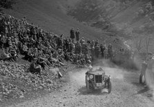 MG M type climbing a steep hill during a motoring trial, c1930s. Artist: Bill Brunell.