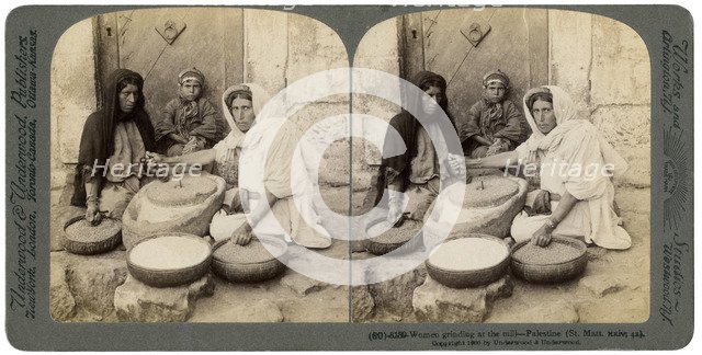 Women grinding at the mill, Palestine, 1900.Artist: Underwood & Underwood