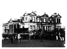 Old Tom Morris outside the Old Course Clubhouse at St Andrews in Scotland, c1900. Artist: Unknown.