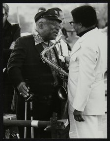 Count Basie chatting with Illinois Jacquet at the Capital Radio Jazz Festival, London, July 1979. Artist: Denis Williams