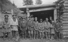 Group of Shoria Men with Village Headmen by a House, 1913. Creator: GI Ivanov.