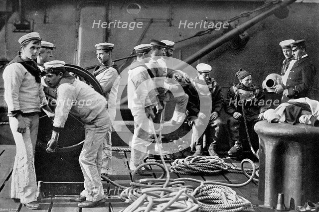 The diver on board ship, 1896. Artist: Gregory & Co