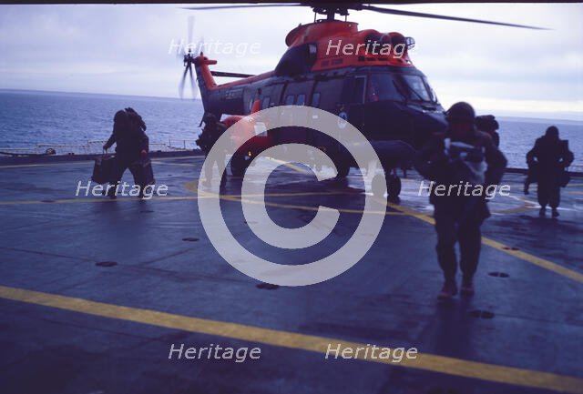 Helicopter on an aircraft carrier, Falklands War, 1982. Creator: Luis Rosendo.