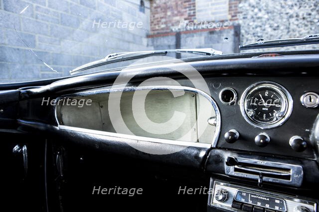 Glove compartment of a 1961 Aston Martin DB4 GT SWB lightweight. Creator: Unknown.