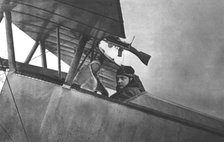 ''Combat Aerien; Guynemer; Le jeune heros sur son Nieuport de Chasse', 1917. Creator: Unknown.