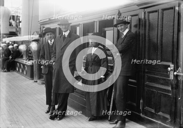 William Gibbs McAdoo, Secretary of The Treasury, Mrs. Albert Sidney Burleson; Target Practice, 1913. Creator: Harris & Ewing.