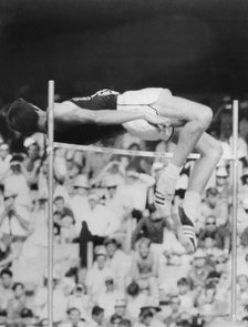 Dick Fosbury (b1947) performing his famous 'fosbury flop' during the Mexico Olympics, 1968. Artist: Unknown